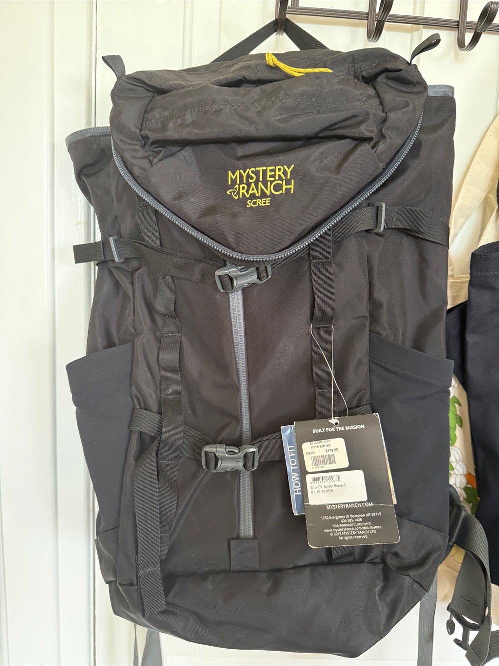 MYSTERY RANCH Scree Backpack in Black with Yellow Accent